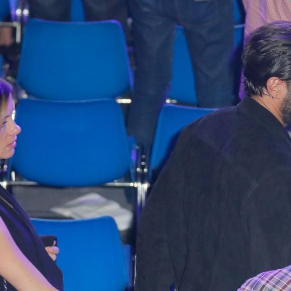 Maxim Nucci (Yodelice)  et sa compagne enceinte Isabelle Ithurburu - Maxim Nucci (Yodelice)  et sa compagne enceinte Isabelle Ithurburu assistent au match de boxe de Tony Yoka au palais des sports de Paris, le 23 juin 2018 © Veeren-CVS/Bestimage