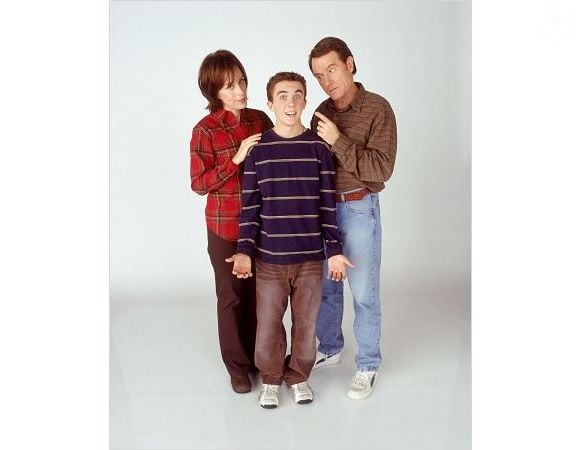 Frankie Muniz entre ses parents de fiction, Jane Kaczmarek et Bryan Cranston, dans la série Malcolm, 2000-2006.