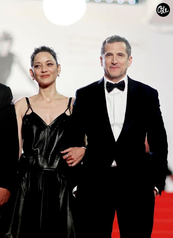 Marion Cotillard et Guillaume Canet - Descente des marches du film « Karma » lors du 79ème Festival International du Film de Cannes, le 15 mai 2026. © Jacovides-Moreau / Bestimage