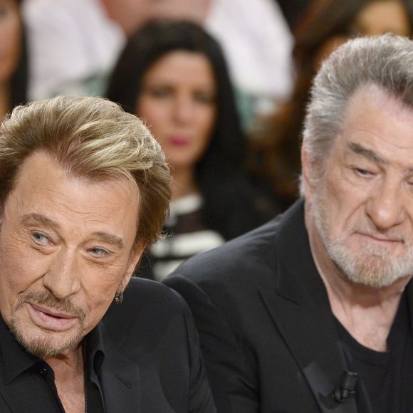Johnny Hallyday et Eddy Mitchell - Enregistrement de l'émission "Vivement Dimanche" à Paris le 14 mars 2014. L'émission sera diffusée ce dimanche 16 Mars. © COADIC GUIREC / BESTIMAGE
