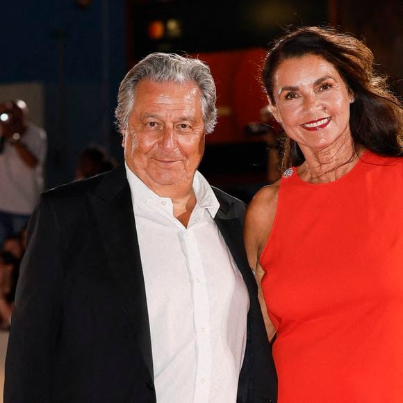 Christian Clavier et Isabelle de Araujo foulent le tapis rouge du "Filming Italy Award" lors de la 82e édition du Festival international du film de Venise, le 31 août 2025 à Venise, en Italie. Photo de Marco Piovanotto/Abaca