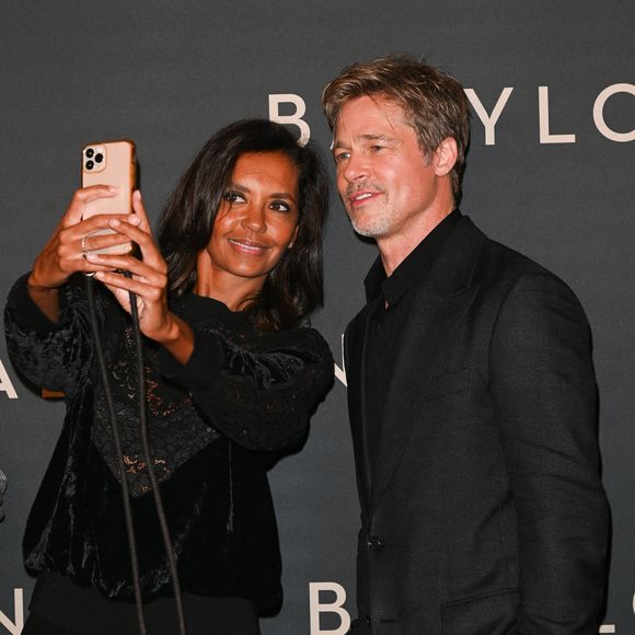 Brad Pitt et Karine Le Marchand à la première du film "Babylon" au cinéma Le Grand Rex à Paris, France, le 14 janvier 2023. © Coadic Guirec/Bestimage