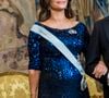 La belle brune aux yeux bleus portait une robe à sequins prêtée par sa belle-soeur, la princesse Victoria de Suède. 

La princesse Sofia (enceinte) - Arrivée de la famille royale de Suède au dîner en l'honneur des lauréats du Prix Nobel 2024 au palais royal de Stockholm. Le 11 décembre 2024