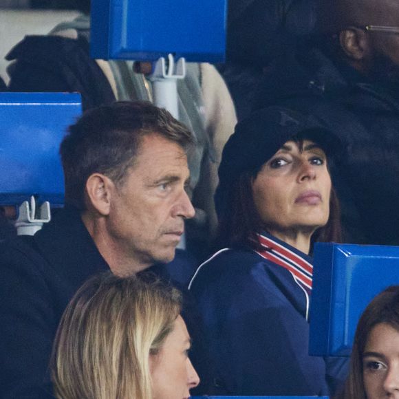 Daniel Riolo et Géraldine Maillet en tribunes du match de Ligue 1 McDonald's opposant le Paris Saint-Germain (PSG) au Racing Club de Strasbourg Alsace (4-2) au Parc des Princes à Paris, France, le 19 octobre 2024. Cyril Moreau/Bestimage