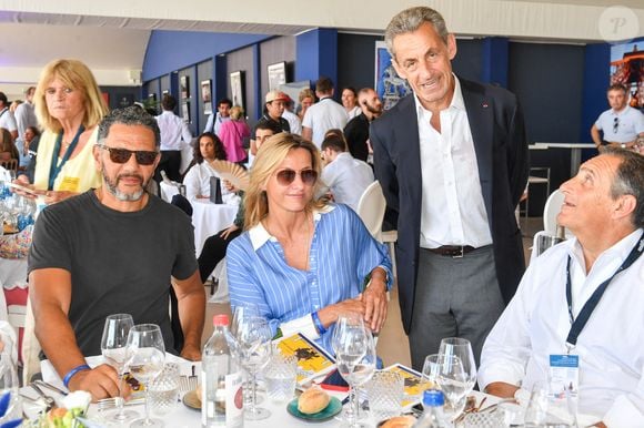 Exclusif - Roschdy Zem, Sarah Poniatowski, Nicolas Sarkozy et Serge Varsano, PDG de Sucres et Denrées dans l'Espace VIP lors de la 9ème édition du "Longines Paris Eiffel Jumping" au Champ de Mars à Paris, France, le 25 juin 2023. © Perusseau-Veeren/Bestimage