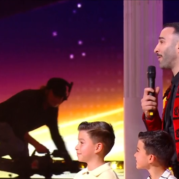 Adil Rami et ses jumeaux dans "Danse avec les stars", capture d'écran TF1.  Le 11 avril 2025.