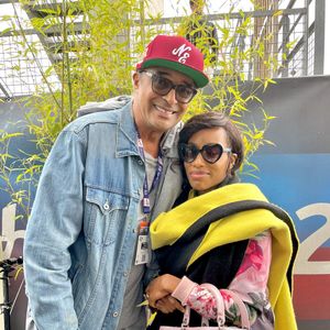 Yannick Noah et sa compagne Malika, enceinte, lors des "24H du Mans", le 15 juin 2024. © Fabien Faure/Bestimage