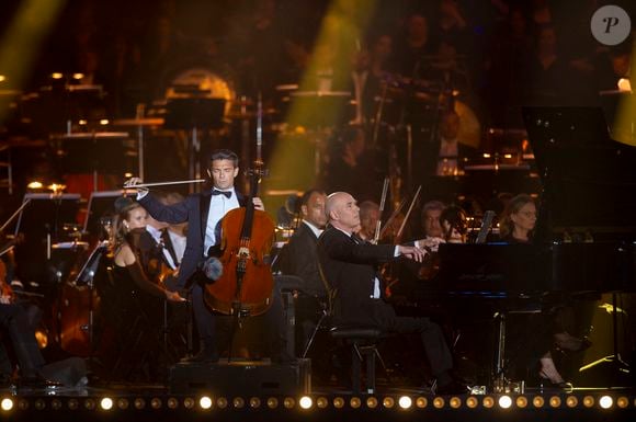 Exclusif - Gautier Capuçon, Jérôme Ducros - 13ème édition du Concert de Paris aux pieds de la Tour Eiffel à l’occasion de la fête nationale du 14 juillet proposé par Radio France, France Télévisions, la Ville de Paris, et Électron Libre Productions.

© Perusseau / Clovis / Bestimage