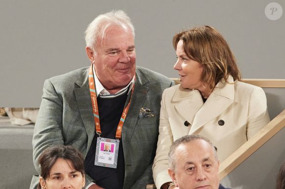 Cendrine Dominguez et son mari Jean Christophe Kerdelhue dans les tribunes (night session) des Internationaux de France de tennis de Roland Garros 2024 à Paris, France, le 31 mai 2024.

© Jacovides-Moreau/Bestimage