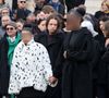 Ma mère, c'était la gentillesse. Elle arrivait à me faire sourire, même quand ça n'allait pas. Elle sentait quand je n'allais pas bien", a-t-elle déclaré devant l'audience.

Iris et Maya, les filles de la défunte, Choukri Gabteni - Sorties des obsèques d’Isabelle Mergault à la Coupole du Père-Lachaise à Paris le 30 mars 2026. © Cyril Moreau - Dominique Jacovides / Bestimage