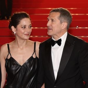 À l’issue de la projection de Karma, Guillaume Canet n’a pas pu retenir son émotion et a tenu à adresser quelques mots à son ex-compagne devant une salle particulièrement émue.

Marion Cotillard et Guillaume Canet - Descente des marches du film " Karma " lors du 79ème Festival International du Film de Cannes. © Jacovides-Moreau / Bestimage