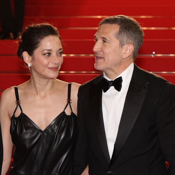 À l’issue de la projection de Karma, Guillaume Canet n’a pas pu retenir son émotion et a tenu à adresser quelques mots à son ex-compagne devant une salle particulièrement émue.

Marion Cotillard et Guillaume Canet - Descente des marches du film " Karma " lors du 79ème Festival International du Film de Cannes. © Jacovides-Moreau / Bestimage
