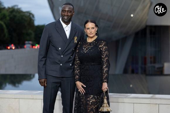 Omar Sy et sa Helene (bijoux Tasaki) - Photocall du dîner "Prelude pour les JO" à la Fondation Vuitton à Paris, France, le 25 juillet 2024. © Olivier Borde/Bestimage