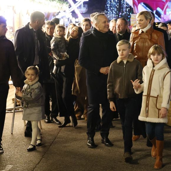 La princesse Charlene de Monaco avec ses enfants, le prince héréditaire Jacques et la princesse Gabriella, a Inauguré le traditionnel Marché de Noël de Monaco, le 6 décembre 2024. Ils étaient accompagné par le nouveau ministre d'Etat de la Principauté © JC VINAJ / Pool Monaco / Bestimage