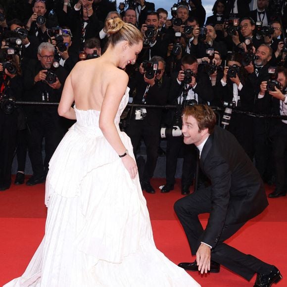 Jennifer Lawrence et Robert Pattinson assistent au tapis rouge de "Die My Love" lors du 78ème Festival de Cannes au Palais des Festivals le 17 mai 2025 à Cannes, France. Photo par Jerome Domine/ABACAPRESS.COM