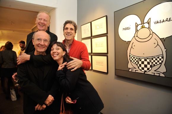 Jean Teulé, Philippe Geluck, Shirley et Dino (Corinne et Gilles Benizio) - Vernissage de l'exposition "Tout L'Art Du Chat" de Philippe Geluck à la galerie Huberty-Breyne à Paris, le 14 octobre 2014.