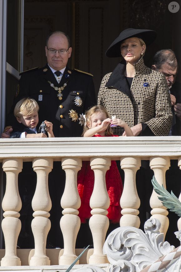 HSH Le Prince Albert II , la Princesse Charlène de Monaco et leurs enfants Jacques et Gabriella assistent depuis le balcon au défilé sur la Place du Palais lors des cérémonies de la Fête Nationale. Monaco le 19 novembre 2018. Photo ABACAPRESS.COM