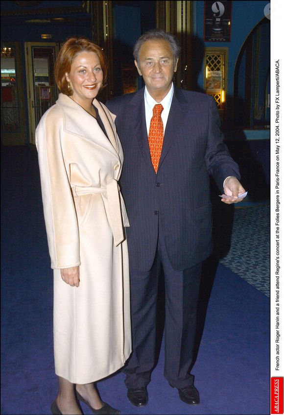 L'acteur français Roger Hanin et une amie assistent au concert de Regine aux Folies Bergères à Paris-France le 12 mai 2004. Photo par FX Lamperti/ABACA.
