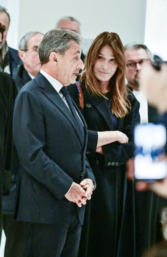 Nicolas Sarkozy et sa femme Carla Bruni - Nicolas Sarkozy condamné à 5 ans de prison à l'issue du procès de l'affaire du financement libyen au tribunal correctionnel de Paris, le 25 septembre 2025. L'ancien chef de l'Etat était accompagné de sa femme, C.Bruni. Nicolas Sarkozy, jugé coupable d’association de malfaiteurs, sera prochainement convoqué en vue de lui signifier la date de son incarcération. 
© Christian Liewig / Bestimage