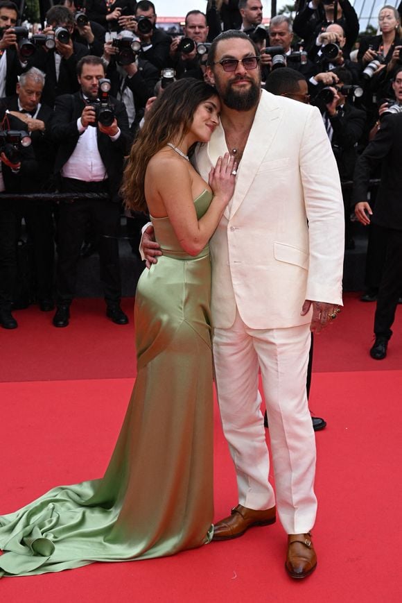 Adria Arjona, Jason Momoa assistant à la projection de "Highest 2 Lowest" au 78ème Festival de Cannes à Cannes, France, le 19 mai 2025. Photo : Doug Peters/PA Wire.
