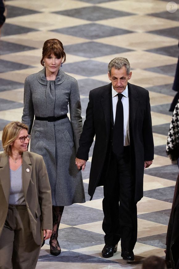 Carla Bruni et son époux Nicolas Sarkozy assistent à la cérémonie de réouverture de la cathédrale Notre-Dame de Paris, le 7 décembre 2024. Photo par Dominique Jacovides/Pool/ABACAPRESS.COM