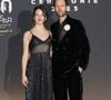 Pour l’occasion, elle portait une chemise rayée ouverte sous un blazer noir, associée à un jean et une ceinture à boucle dorée.

Rebecca Marder et Benjamin Lavernhe au photocall du dîner de la 50ème édition de la cérémonie des César au Fouquet's à Paris, France, le 28 février 2025. © Coadic Guirec/Bestimage