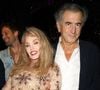 L'écrivain Bernard-Henri Lévy sort un nouveau livre, le plus intimiste qu'il ait écrit. Le philosophe marié depuis 1993 à l’artiste Arielle Dombasle, 

Exclusif - Bernard-Henri Levy avec sa femme Arielle Dombasle - Arielle Dombasle en showcase pour la promotion du lancement de l'album "Iconics" au Bœuf sur le Toit à Paris le 15 mai 2024. © Coadic Guirec/Bestimage