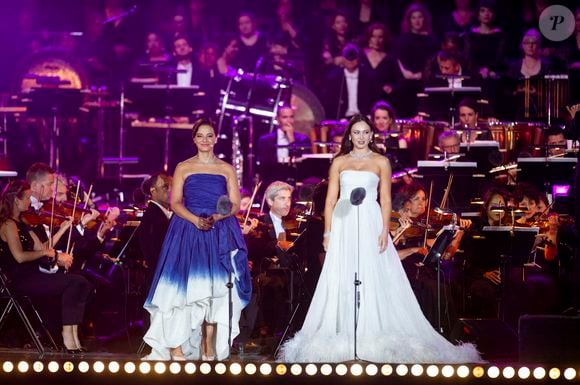 Exclusif - Aida Garifullina, Rihab Chaieb - 13ème édition du Concert de Paris aux pieds de la Tour Eiffel à l’occasion de la fête nationale du 14 juillet proposé par Radio France, France Télévisions, la Ville de Paris, et Électron Libre Productions.

© Perusseau / Clovis / Bestimage