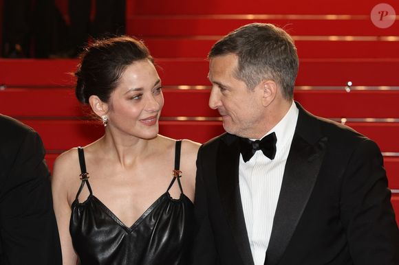 Marion Cotillard et Guillaume Canet - Descente des marches du film " Karma " lors du 79ème Festival International du Film de Cannes. © Jacovides-Moreau / Bestimage