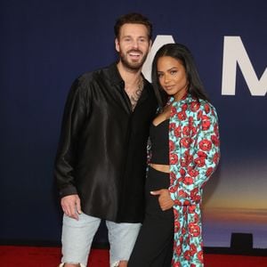 Matt Pokora et sa femme Christina Milian au photocall lors de la première du film "Ambulance" à Los Angeles le 4 avril 2022. © Broadimage / Bestimage