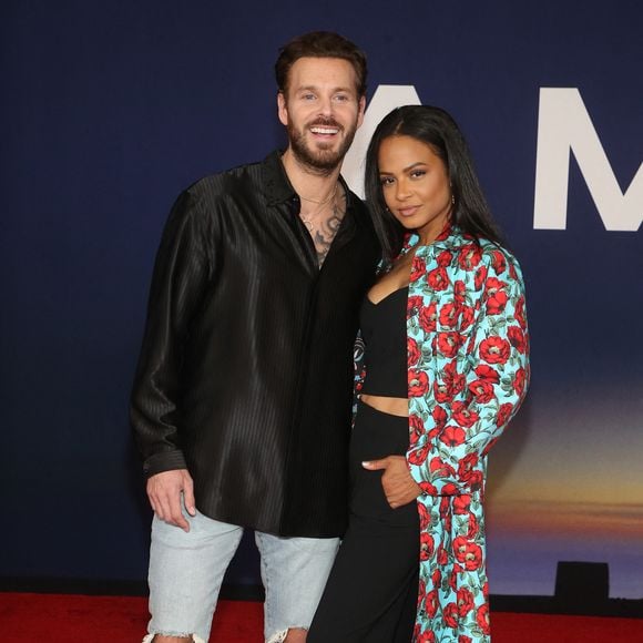 Matt Pokora et sa femme Christina Milian au photocall lors de la première du film "Ambulance" à Los Angeles le 4 avril 2022. © Broadimage / Bestimage