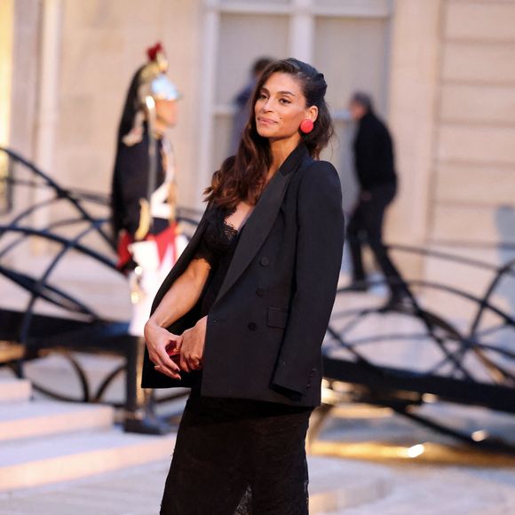 "Santé à toutes les mères qui gèrent seules par moment ou tout le temps. Nos enfants, on les aime même s’ils mettent nos nerfs à rude épreuve." 

Tatiana Silva (enceinte, ancienne miss Belgique) arrivant au dîner d'état au palais de l'Elysée à Paris en l'honneur de la visite du roi et de la reine de Belgique en France le 14 octobre 2024. © Dominique Jacovides / Bestimage