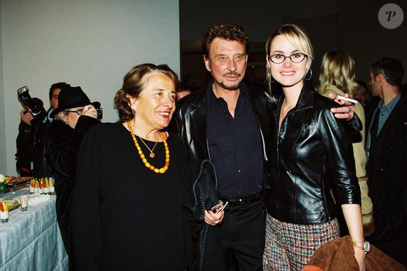 Archives - Xavière Tiberi, Johnny et sa femme Laeticia Hallyday lors du vernissage de l'exposition des oeuvres de Paul Belmondo "Le Dessin pour Passion" au Petit Palais à Paris JLPPA / Bestimage