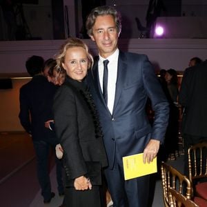 Exclusif - Caroline Roux et son mari Laurent Solly - Le professeur S.Lyonnet, président de l'Institut des maladies génétiques, et le galériste K. Mennour ont organisé la 4ème édition de la soirée "Heroes for Imagine", une grande vente aux enchères d'oeuvres d'art, animée par G.Elmaleh et dirigée par Christie's, à l'institut Imagine, 24 boulevard du Montparnasse dans le 15ème arrondissement de Paris, France, le 12 septembre 2022. © Dominique Jacovides/Bestimage