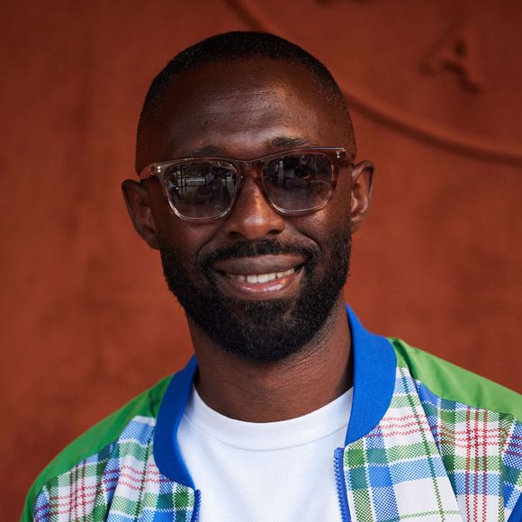 Qui s'est fait connaître du grand public au sein du Jamel Comedy Club

Thomas Ngijol au Village lors de la nocturne des Internationaux de France de tennis de Roland Garros 2023 à Paris, France, le 2 juin 2023. © Moreau-Jacovides/Bestimage`