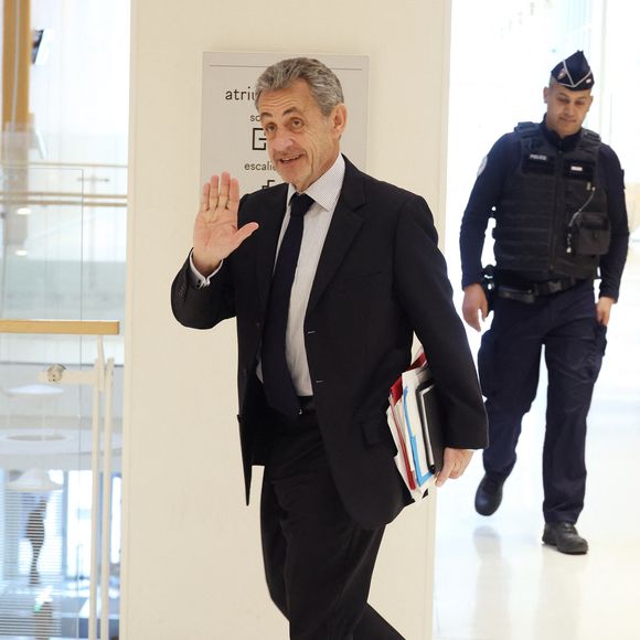 Nicolas Sarkozy arrive au tribunal pour les réquisitoires dans le cadre de son procès des soupçons de financement libyen de sa campagne éléctorale de 2007, le 26 mars 2025. 
© Denis Guignebourg / Bestimage