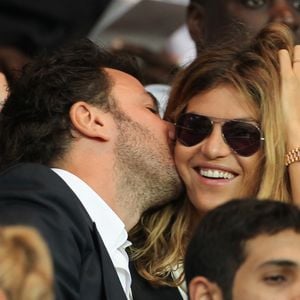Michael Youn et sa compagne Isabelle Funaro - People au match du championnat de France de football entre le PSG et AC Ajaccio au Parc des Princes, le 18 aout 2013. (Marc Ausset Lacroix / Bestimage).
