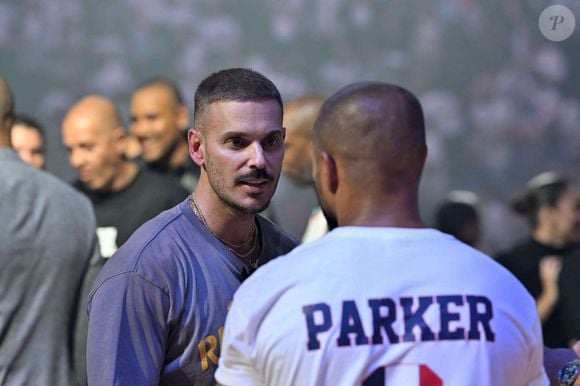 Dans ce domaine, il a pu bénéficier des conseils de Tony Parker.
Matt Pokora (M. Pokora) au match de préparation aux Jeux Olympiques Paris 2024 entre la France à la Serbie (67-79) à Decines-Charpieu, France, le 12 juillet 2024. © Frédéric Chambert/Panoramic/Bestimage