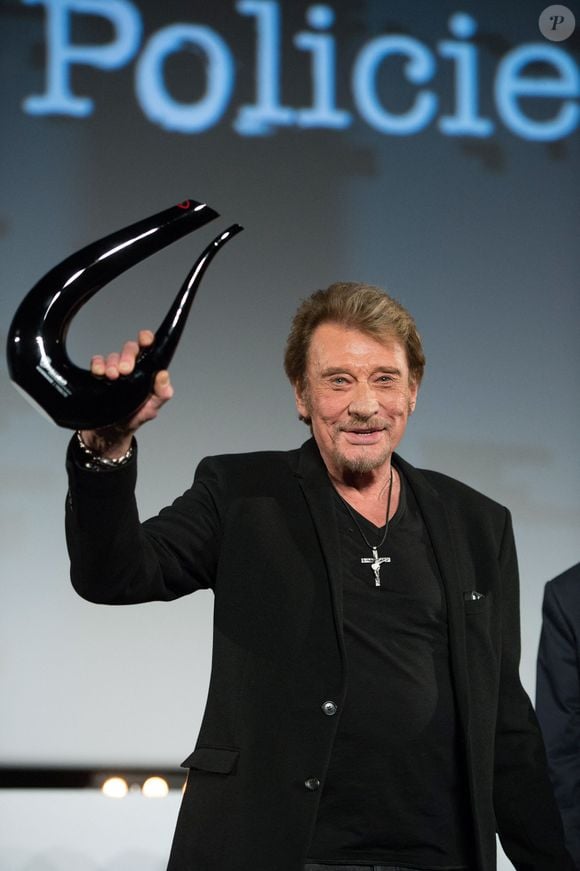 David Hallyday et Emma Smet marchent sur les traces de Johnny, leur père et grand-père. Johnny Hallyday lors de la cérémonie d'ouverture du 6e Festival International du Film Policier à Beaune, France, le 2 avril 2014. Photo Nicolas Gouhier/ABACAPRESS.COM