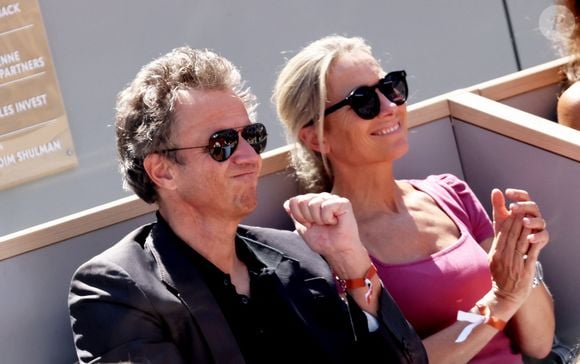 Anne-Sophie Lapix et son mari Arthur Sadoun - Célébrités dans les tribunes des Internationaux de France de tennis de Roland Garros 2024 à Paris le 7 juin 2024.  © Jacovides-Moreau/Bestimage