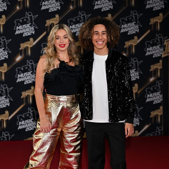 Emma et Masseo de la Star Academy au photocall de la 26ème édition des NRJ Music Awards à Cannes, le 1er novembre 2024. © Bebert-Guignebourg/Bestimage