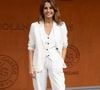 L'animatrice a misé sur un combo gagnant : un tailleur immaculé et des baskets ultra-tendances. 

Faustine Bollaert au photocall du village lors des Internationaux de France de Tennis de Roland Garros 2026, à Paris, France, le 5 juin 2026. © Jacovides-Moreau/Bestimage