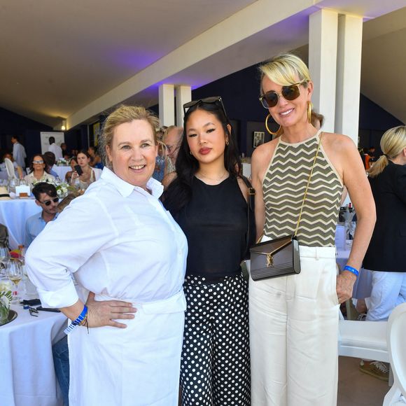 Exclusif - La cheffe Hélène Darroze, Laeticia Hallyday et sa fille Joy dans l'Espace VIP lors de la 9ème édition du "Longines Paris Eiffel Jumping" au Champ de Mars à Paris, France, le 25 juin 2023. © Perusseau-Veeren/Bestimage