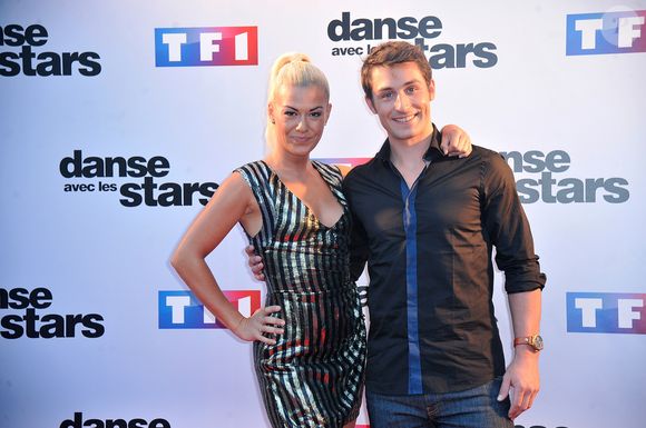 Brian Joubert et Katrina Patchett - Photocall de présentation de la nouvelle saison de "Danse avec les Stars 5" au pied de la tour TF1 à Paris, le 10 septembre 2014.