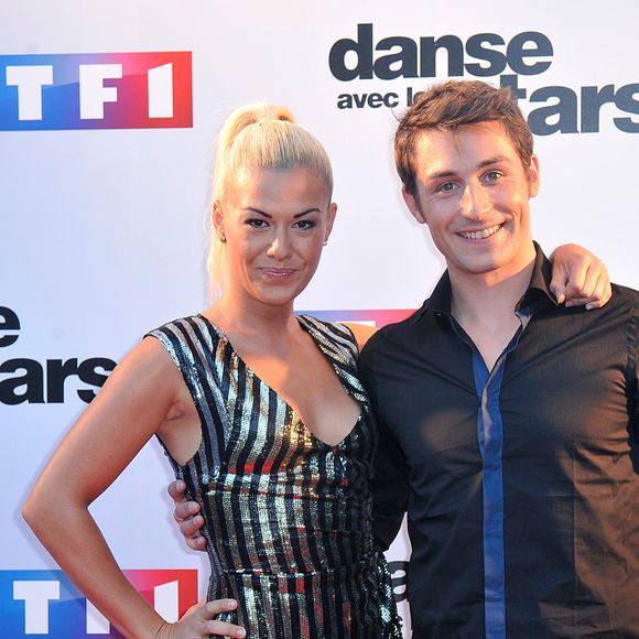 Brian Joubert et Katrina Patchett - Photocall de présentation de la nouvelle saison de "Danse avec les Stars 5" au pied de la tour TF1 à Paris, le 10 septembre 2014.