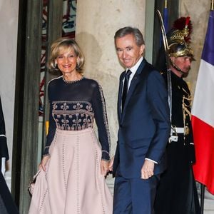 Bernard Arnault ( PDG LVMH) et sa femme Hélène Mercier-Arnault - Arrivées au dîner d'état en l'honneur du président de la république de Chine X.Jinping au Palais de L'Elysée, Paris, le 25 mars 2019. ©Dominique Jacovides / BestImage