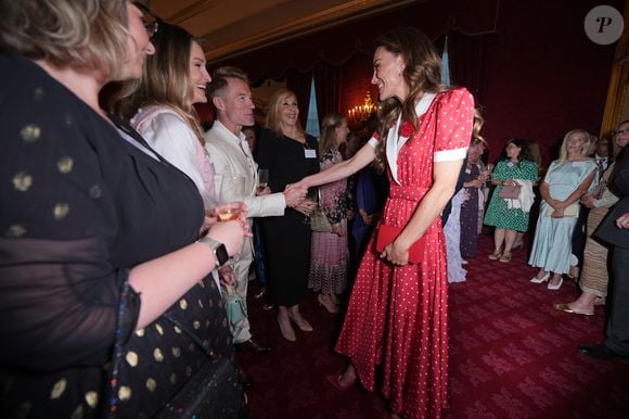 La princesse de Galles rencontre Ronan Keating et son épouse Storm, lors d'une réception organisée par Cancer Research UK à l'occasion du 125e anniversaire de l'organisation caritative, au St James's Palace, à Londres. 

©Bestimage