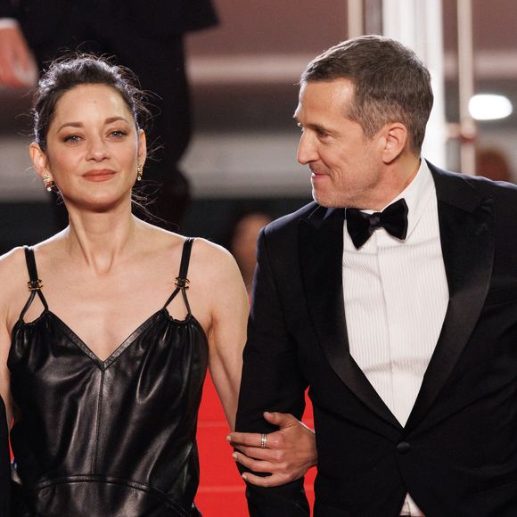 Marion Cotillard et Guillaume Canet ont foulé les marches du tapis rouge lors du 79e Festival de Cannes, à l’occasion de la projection de "Karma"


Marion Cotillard et Guillaume Canet - Descente des marches du film " Karma " lors du 79ème Festival International du Film de Cannes, le 15 mai 2026. © Jacovides-Moreau / Bestimage