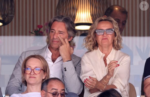 Laurent Solly et sa femme Caroline Roux - Célébrités dans les tribunes de la finale homme des Internationaux de France de tennis de Roland Garros 2024 à Paris le 9 juin 2024. © Jacovides-Moreau/Bestimage