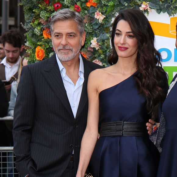 George Clooney et sa femme Amal arrivent à l'événement "Postcode Lottery Charity Gala" au McEwan hall à Edimbourg le 14 mars 2019. AGENCE / BESTIMAGE